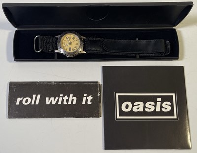 Lot 499 - OASIS - PROMOTIONAL MEMORABILIA INC WATCH/RIZLA/CD.