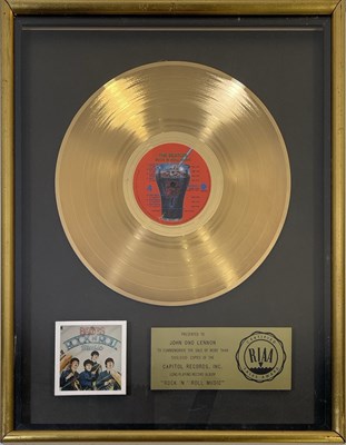 Lot 279 - THE BEATLES - RIAA GOLD DISC AWARD PRESENTED TO JOHN LENNON FOR 'ROCK N ROLL MUSIC'.