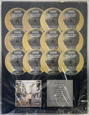 Lot 508 - OASIS - 'WHAT'S THE STORY..' AWARD PRESENTED TO DICK GREEN.