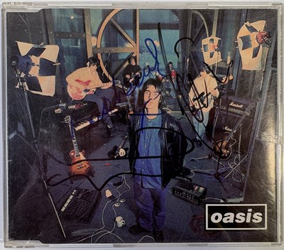 Lot 516 - OASIS - A SIGNED CD SINGLE.