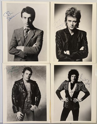 Lot 428 - QUEEN - FULLY SIGNED SET OF PHOTOGRAPHS.