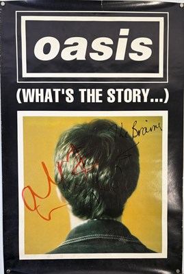Lot 511 - OASIS - NOEL GALLAGHER AND ALAN WHITE SIGNED PROMOTIONAL POSTER.
