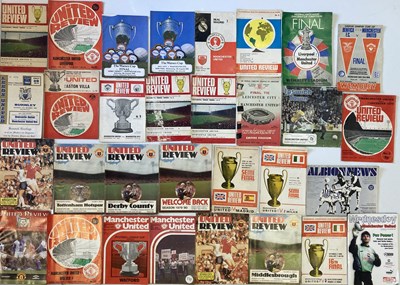 Lot 115 - MANCHESTER UNITED - HOME AND AWAY PROGRAMMES - 1960S-90S.