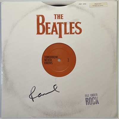 Lot 299 - THE BEATLES - PAUL MCCARTNEY SIGNED COPY OF TOMORROW NEVER KNOWS.