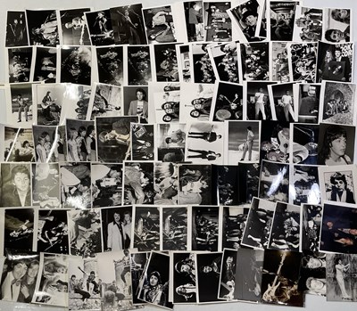 Lot 227 - THE BEATLES - PAUL MCCARTNEY / WINGS - LARGE PHOTO COLLECTION.