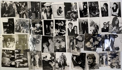 Lot 237 - THE BEATLES - JOHN LENNON PHOTO COLLECTION.