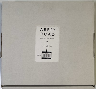 Lot 187 - THE BEATLES - STILL SEALED SPECIAL EDITION ABBEY ROAD BOOK SIGNED BY GEORGE MARTIN.