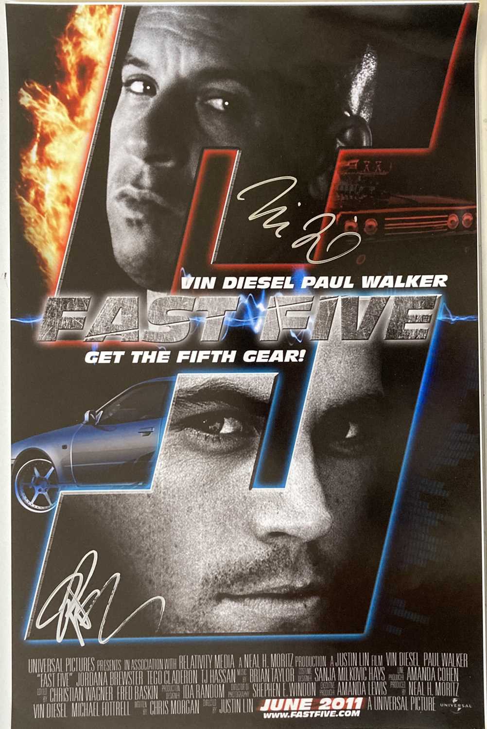Lot 68 - FAST AND THE FURIOUS - VIN DIESEL AND PAUL WALKER SIGNED.