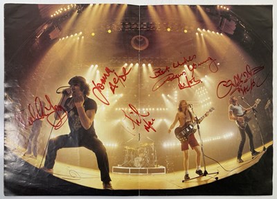 Lot 558 - AC/DC - FULLY SIGNED 1982 TOUR PROGRAMME.