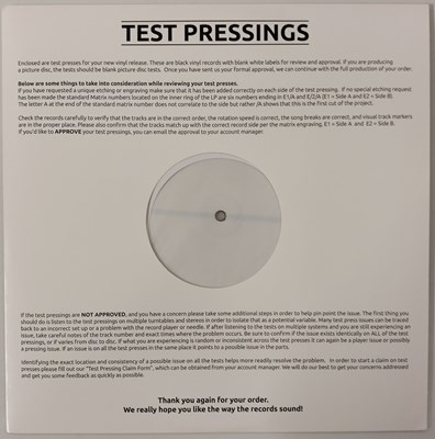 Lot 115 - ROBBIE WILLIAMS - LIFE THRU A LENS SIGNED WHITE LABEL TEST PRESSING LP