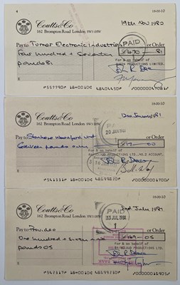 Lot 549 - QUEEN - A SET OF THREE C 1970S CHEQUES SIGNED BY THE BAND.