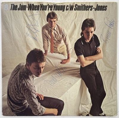Lot 411 - THE JAM - SIGNED 7" COPY OF 'WHEN YOU'RE YOUNG'.
