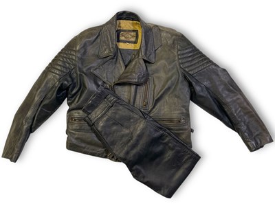 Lot 731 - KEITH EMERSON - OWNED AND WORN VINTAGE ARMANI LEATHER JACKET AND GOSSIPS LEATHER TROUSERS.
