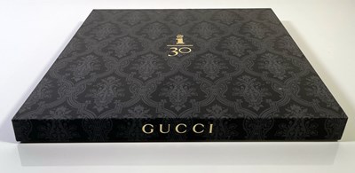 Lot 745 - U2 - ALL THAT YOU CAN'T LEAVE BEHIND - JOHN CURRIN SIGNED LIMITED EDITION GUCCI SET.