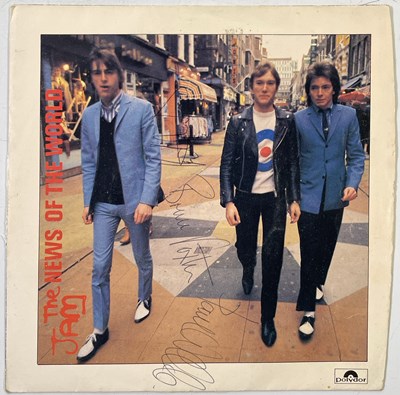Lot 416 - THE JAM - SIGNED COPY OF NEWS OF THE WORLD.