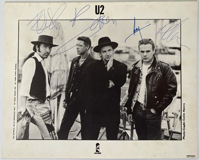 Lot 500 - U2 - FULLY SIGNED PROMOTIONAL PHOTO.