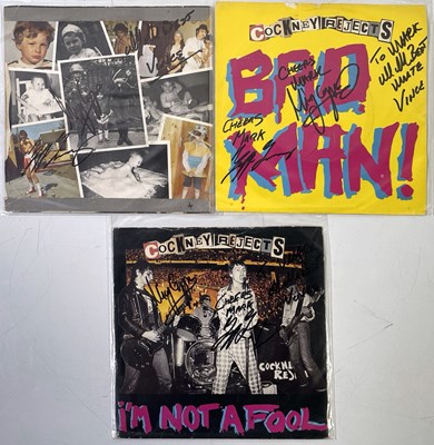 Lot 277 - COCKNEY REJECTS - SIGNED SINGLES.