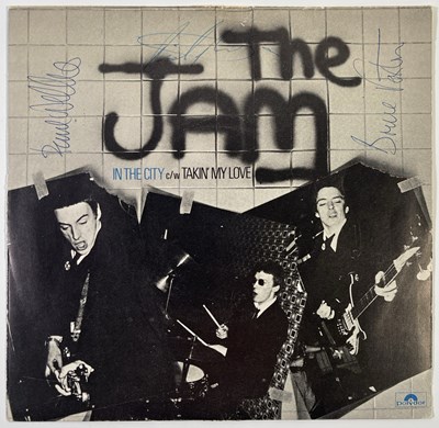 Lot 575 - THE JAM - SIGNED COPY OF 'IN THE CITY'.