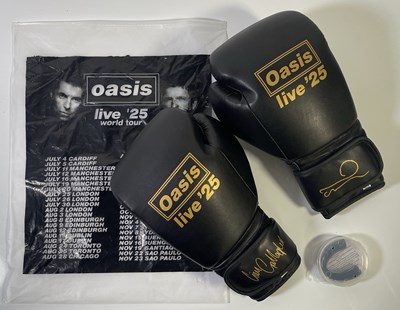Lot 606 - OASIS - 2025 LIMITED EDITION SIGNED BOXING GLOVES.
