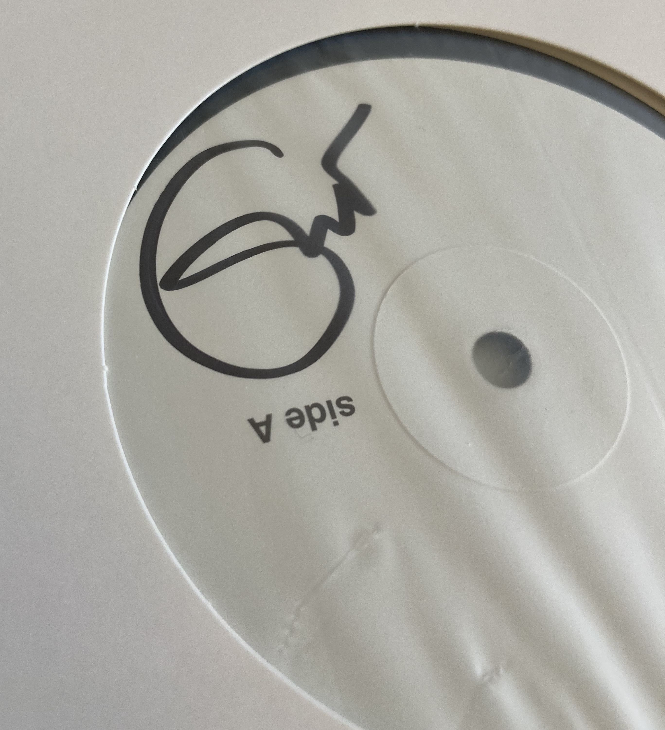 Eric Label Lot 95 - ERIC CLAPTON SIGNED WHITE LABEL TEST PRESSING.