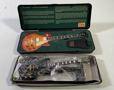 Lot 323 - BB KING / RONNIE WOOD - SIGNED MINI GUITARS.