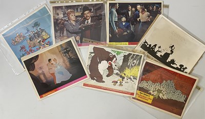 Lot 326 - DISNEY - CAMPAIGN ADVERTISING BOOKS AND SETS OF 8X10" STILLS.