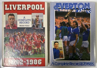 Lot 446 - FOOTBALL MEMORABILIA - LIVERPOOL AND EVERTON - TWO MULTI-SIGNED 'PLAYER RECORD' BOOKS.