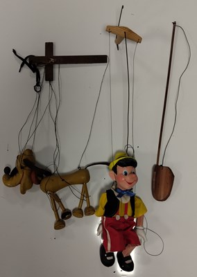 Lot 404 - PINOCCHIO AND PLUTO MARIONETTES