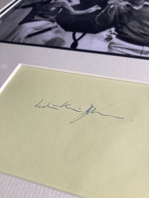 Lot 317 - MADNESS / LINTON KWESI JOHNSON SIGNED.