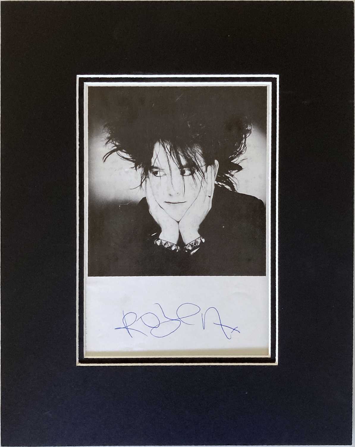 Lot 328 - THE CURE - ROBERT SMITH SIGNED PROMOTIONAL PHOTOGRAPH.