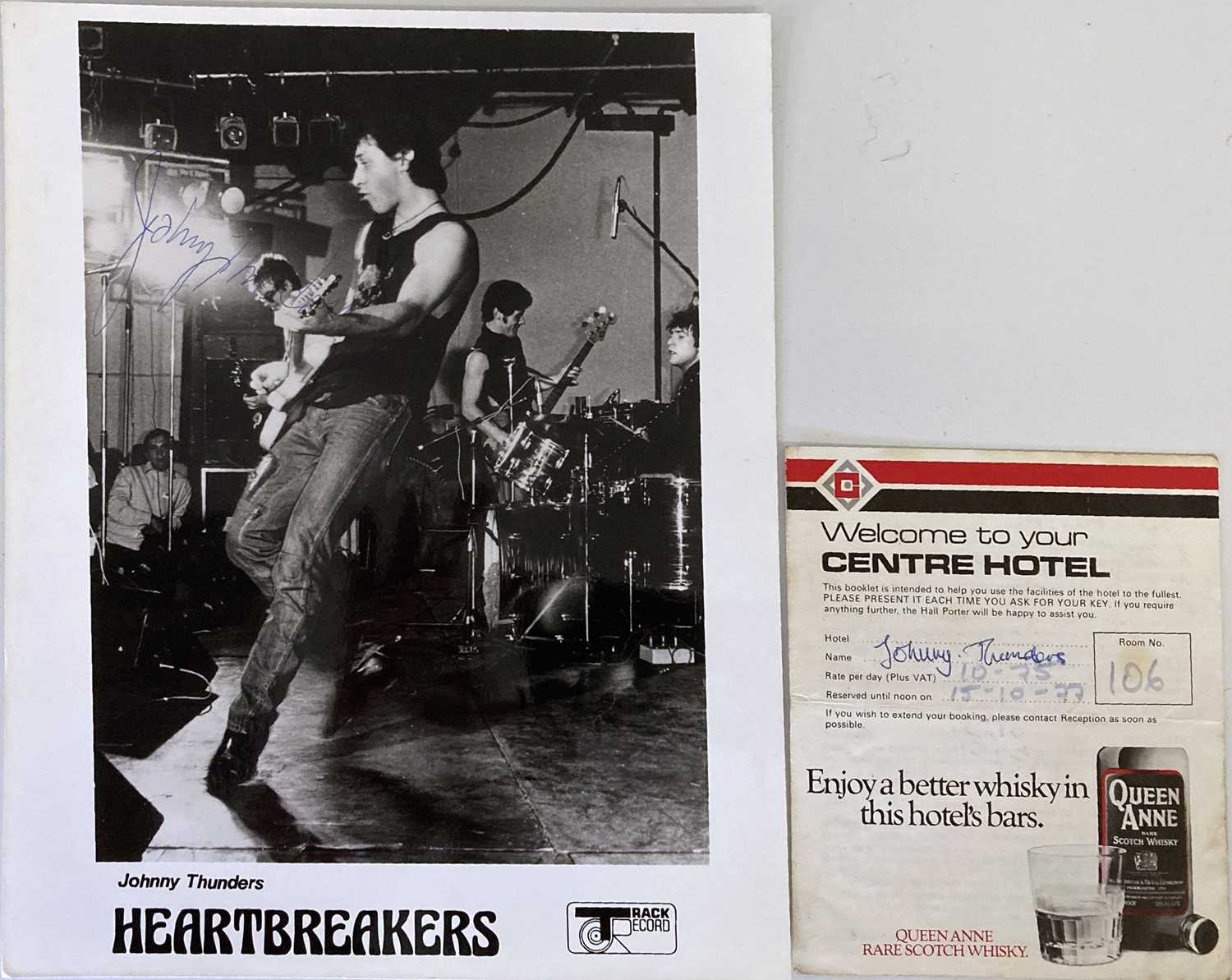 Lot 364 - JOHNNY THUNDERS SIGNED PHOTO AND HOTEL SLIP.