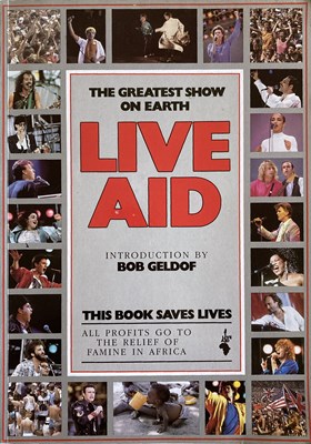 Lot 366 - LIVE AID BOOK SIGNED BY BOB GELDOF / MIDGE URE.