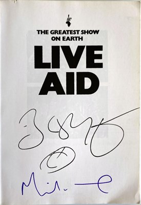 Lot 366 - LIVE AID BOOK SIGNED BY BOB GELDOF / MIDGE URE.